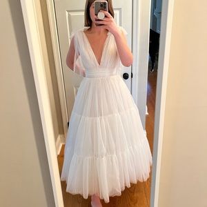 Elegant white deep v neck dress with tulle bowties.